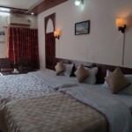 AC FAMILY ROOM TRIPLE BEDDED WITH PRIVATE BALCONY